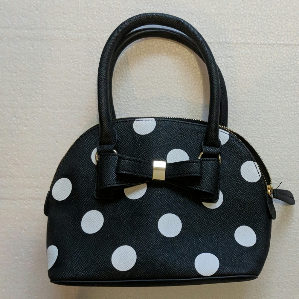 White and black polka dot purse